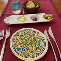 🌱 cúrcuma aioli, harissa, olives and homemade bread   at A ma Maison in Mallorca