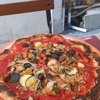 Vegan pizza gluten free (vegetarian pizza) that is the name we just changed the cheese to be vegan at Lorenzo de' Medici in Florence