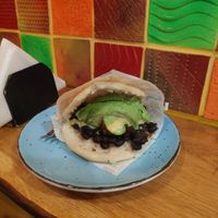 Pabellón vegano: black beans, sweet plantain banana, avocado at Arepera Maracay in Zagreb
