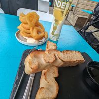 Vegan focaccia and onion rings with vegan aioli at Southsea Beach Cafe in Southsea
