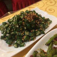 A HUGE plate of fabulous okra and pine nuts.  at Beijing Zheng Long Zhai in Beijing