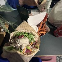 Delicious vegan pita with falafel and fries on the side!  at Garbanzo in Copenhagen