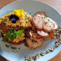 Scrambled tofu on sourdough with crispy potatoes added on the side at Wild Pear Kitchen in New Plymouth