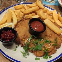 Kohlrabi Schnitzel with Preiselbeeren, Pommes and side salad at Spezlwirtschaft Haidhausen in Munich