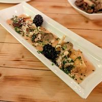FORAGED MUSHROOMS - Braised wild mushrooms on a lightly spiced Ceylon curry sauce bed, topped with sesame seeds & berries. (vg) (gf)  at Brooks in Ilkley