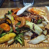 Mixed meats and vegetables on noodles at Vegan 1983 in Erfurt