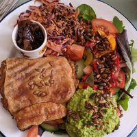 Sausage roll, salad and added smashed peas at Root in Hythe