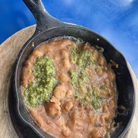 veganized refried heirloom beans by removing the queso fresco  at Mister Oso in Denver