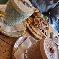 Blue Butterfly Pea & Guarana and Cacao drinks ft. PB & Banana toast in the background at VIBE Plant Based Cafe & Restaurant in Douglas