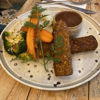 Sausage and mash   at VIBE Plant Based Cafe & Restaurant in Douglas