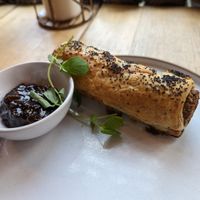 Sausage roll with chutney at VIBE Plant Based Cafe & Restaurant in Douglas
