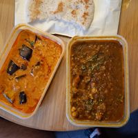 Aubergine and tomato curry (left), chana masala (right). Kallapam (top) at Vellika's in Ramsey