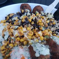 Rice, black lentils, falafel, hummus, corn and tahini dressing at CAVA in Newark