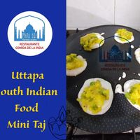 Uttapa Is a South Indian Dish created with dhal flour and potatoes on the top. Vegetarian and delicious dish  at Mini Taj in Oaxaca