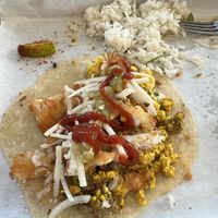 Had cilantro rice, vegan sausage egg and cheese, and vegan “mommie dearest”. This was so delicious with spicy ketchup!  at Basalt in Grand Rapids