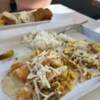 Had cilantro rice, vegan sausage egg and cheese, and vegan “mommie dearest”. This was so delicious with spicy ketchup!  at Basalt in Grand Rapids