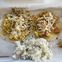 Had cilantro rice, vegan sausage egg and cheese, and vegan “mommie dearest”. This was so delicious with spicy ketchup!  at Basalt in Grand Rapids