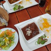 Pomegranate (front) and Spinach-Plum (back) dish with side salads at Shayan in Berlin