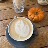 Pumpkin spice latte with oat milk   at Honest Taste in Prague