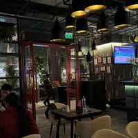 Dining area, bar, and patio  at The Kylin Experience in New Delhi