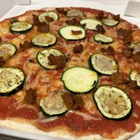 The Bandolera - Tomato, vegan mozzarella, courgette and vegetable sausage.  at Sabriona Pizzeria in Girona
