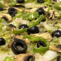 The Foresta - Pesto sauce, vegan mozzarella, mushrooms, black olives, green pepper and Figueres onion.  at Sabriona Pizzeria in Girona