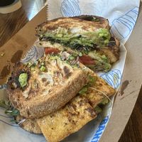 Vegan tofu sandwich, avocado, tomato, and greens  at Black Market Bakers in Edgewater