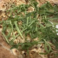 Cipolla Pizza (caramelised onions, rocket and vegan mozzarella)  at Love Italy in Surfers Paradise