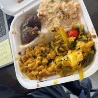Sorry, couldn’t wait to dig in. Jerk chicken, potato salad, cabbage and Mac and cheese.  at Di-Vine Plant Based Cuisine in Forest Park