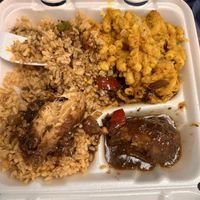 Curry chicken, rice and peas, Mac n cheez  at Di-Vine Plant Based Cuisine in Forest Park