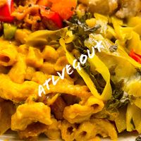 Mac and cheeze, kale and cabbage   at Di-Vine Plant Based Cuisine in Forest Park