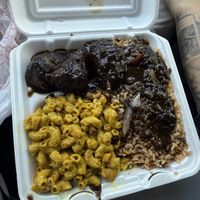 Jerk chicken with rice and peas, and Mac and cheese !   at Di-Vine Plant Based Cuisine in Forest Park