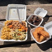 Orange soy chickun, mac n cheese, cabbage. Soy jerk Drumstick , and crispy fried chickin   at Di-Vine Plant Based Cuisine in Forest Park