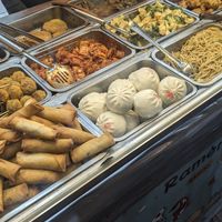 Changing dishes to choose from at Okinawa Comida Rapida in Santiago