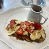 Protein pancakes with fruit, maple syrup and (a lot of) peanut butter (in the little can)   at Zampano in Athens