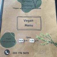 Menu with number and opening hours   at Green Dining in Hua Hin