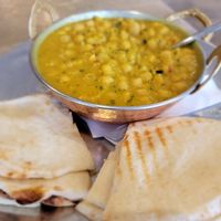 The best spiced chai and chana masala. at Remedy Cafe - South Side in Edmonton