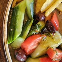 salad and fries at Happy Bar & Grill in Plovdiv