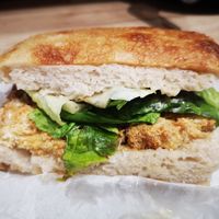 Breaded Tofu Focaccia Sandwich at Beaten by a Whisker in London
