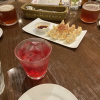 Plum cocktail and gyoza  at T's Restaurant in Tokyo