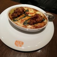 A type of paella with saffron + two vegan chicken pieces at T's Restaurant in Tokyo