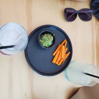 drinks + something to eat while waiting for pizzas. at Coral Vegan Pizza in Playa Del Carmen