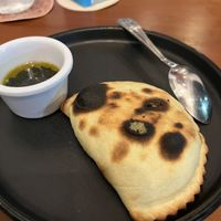 Spinach Empanada was amazing!   at Coral Vegan Pizza in Playa Del Carmen