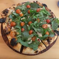 Amazing pizza with almond based cheese  at Coral Vegan Pizza in Playa Del Carmen