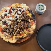 The mushroom pizza is sooooooo incredible  at Coral Vegan Pizza in Playa Del Carmen