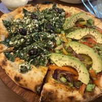 A 50/50 of Mangroovy of the left and The Reef on the right  at Coral Vegan Pizza in Playa Del Carmen