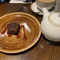 Tiny mocca torte with some tea with soy milk   at The Spread Eagle in Blackburn