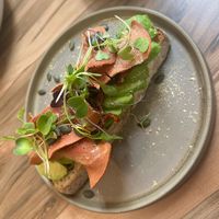 Avocado toast vegan with vegan bacon added  at Malila Coffee in Valencia