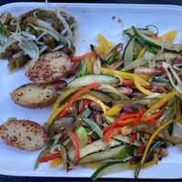 The vegan offer of the day: stir-fried veggies with Araucaria's pine nuts, potatoes with Merkén and Cochayuyo Ceviche at Ruta al Conguillio in Melipeuco