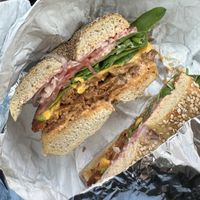 Build your own hot sandwich: Sesame bagel, vegan pastrami, vegan cheddar, spinach, tomato, onion with vegan Russian dressing  at Pearl's Bagels & Bakery in Albany